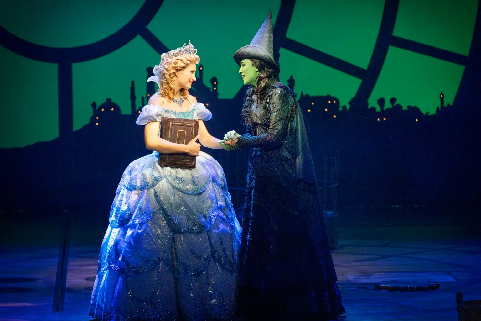Courtney-Monsma-and-Sheridan-Adams-in-WICKED-c-Jeff-Busby.webp